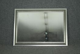 Wall mirror, contemporary silvered frame with bevelled plate. H.75 W.104cm.