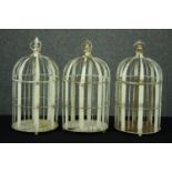 Three painted distressed metal cages. H.51cm. (each)