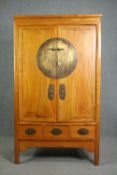Hall cupboard, Chinese teak with incised brass locking plate and fitted interior. H.180 W.105 D.