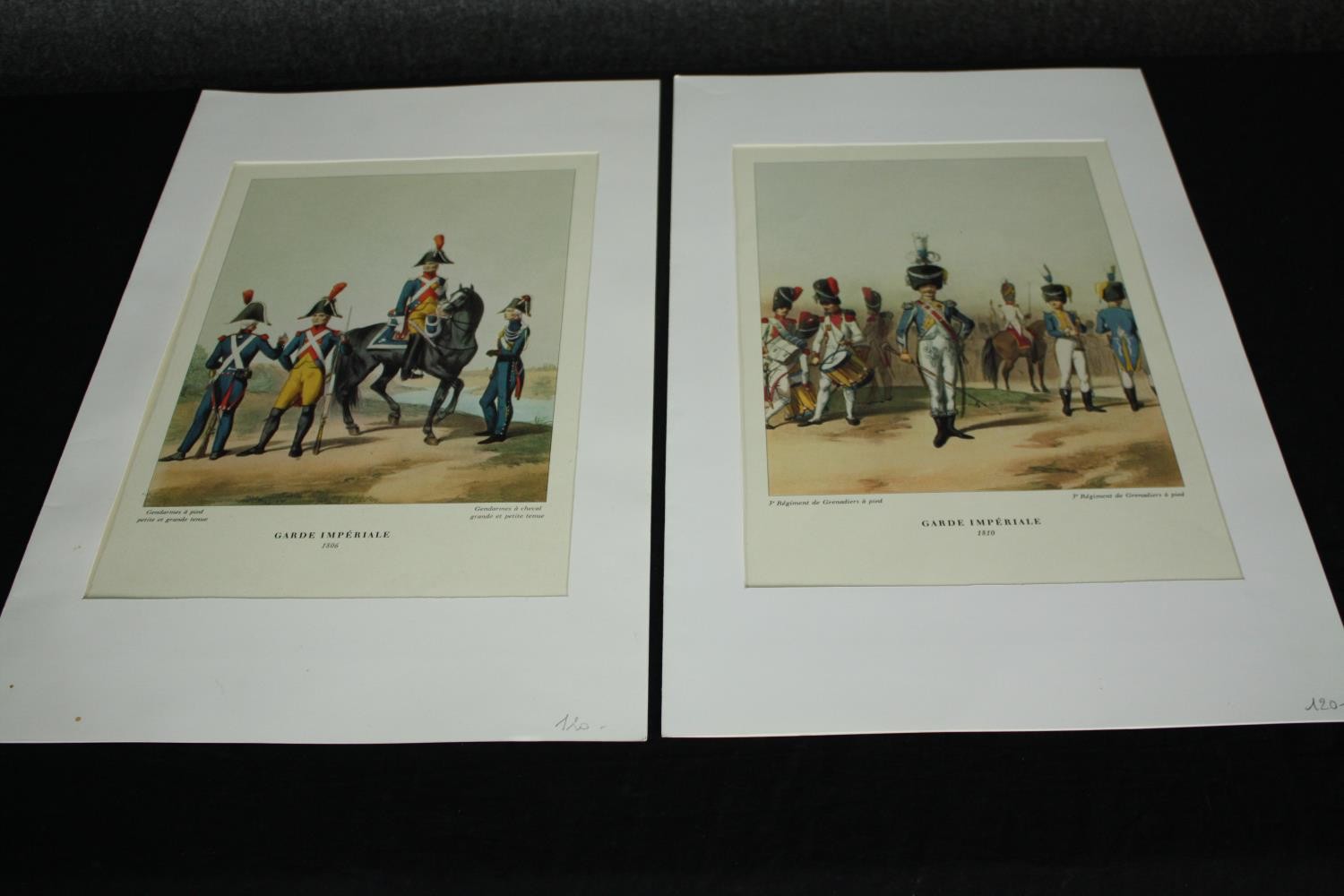 A pair of 19th century hand coloured engravings, French officers. H.51 W.33cm. (each)