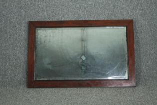 Wall mirror, vintage mahogany framed with bevelled plate. H.64 W.100cm.