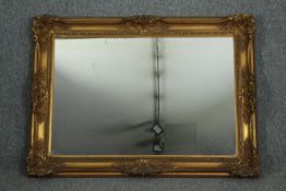 Wall mirror, contemporary gilt framed with bevelled plate. H.80 W.110cm.