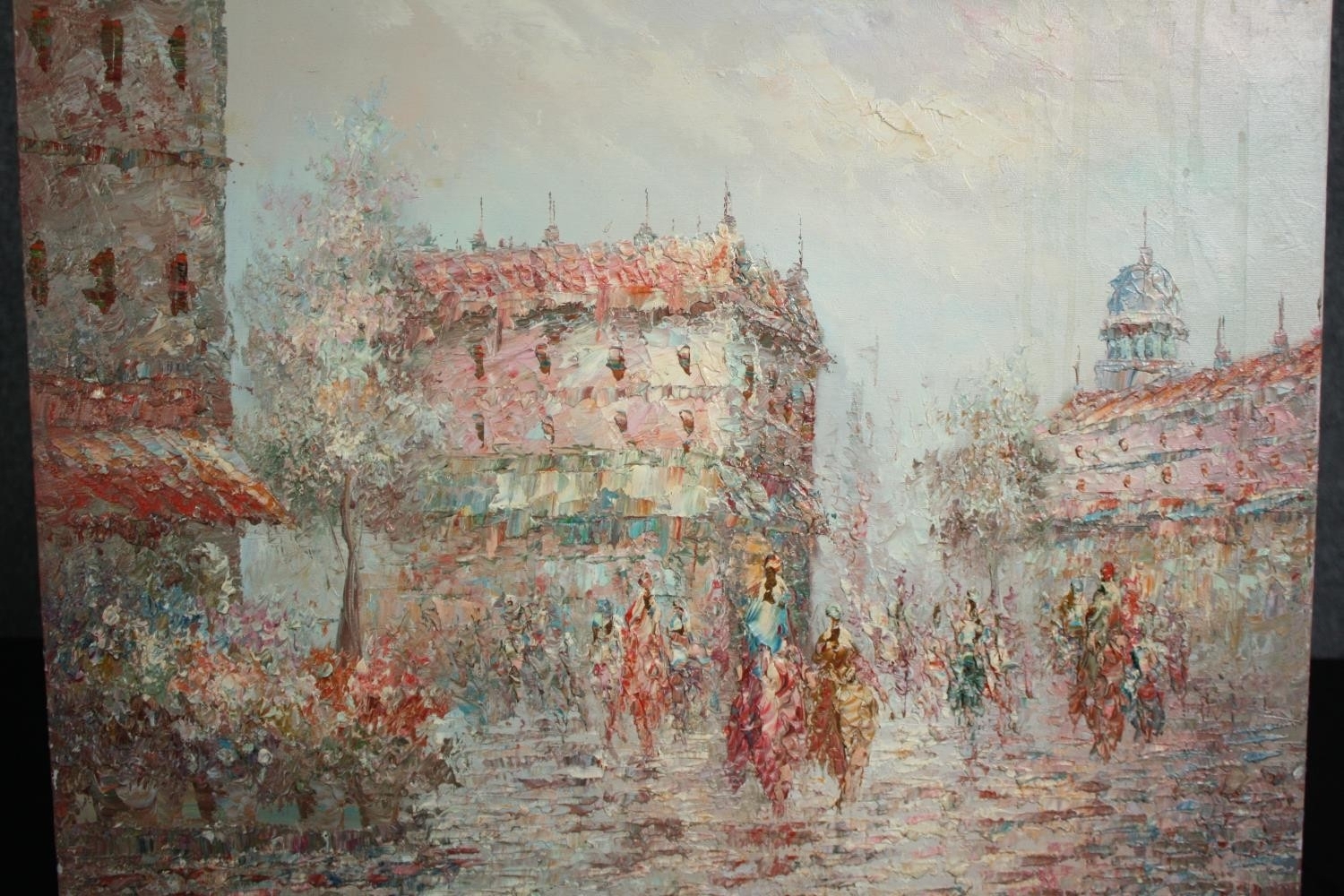 Oil on canvas, Parisian street scene, indistinctly signed. H.51 W.61cm.