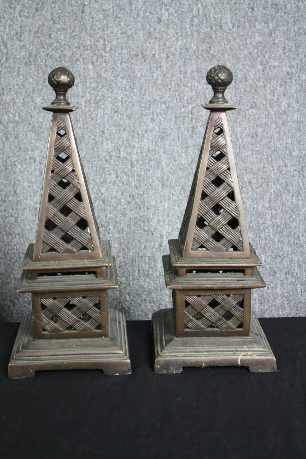 A pair of brass obelisks with basket weave design. H.39cm. (each)