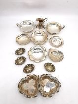 A collection of silver and silver plate, including two twin handled pedestal bon bon dishes, a