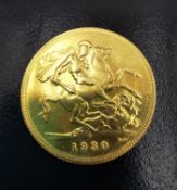 Australia, King George V, 1930 gold sovereign. "P" Perth mint mark, contained in coin capsule.