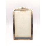 An early 20th century silver mahogany-backed RAF easel picture frame. Relief RAF emblem to the