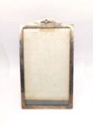 An early 20th century silver mahogany-backed RAF easel picture frame. Relief RAF emblem to the