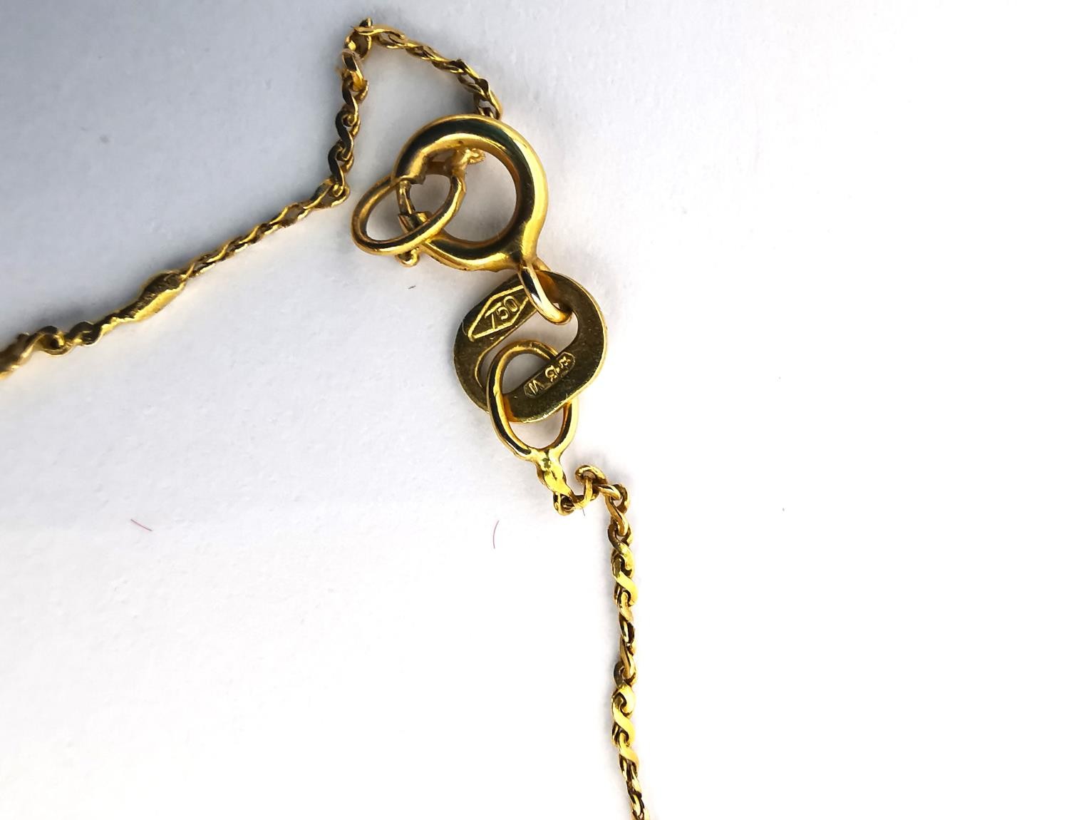 Three broken gold chain link necklaces. A 14ct white gold ball link chain. (Weight 1.50g). An 18ct - Image 5 of 5