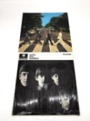 Two vintage Beatles records 'With the Beatles' and 'Abbey Road'. With the Beatles, pressing XEX