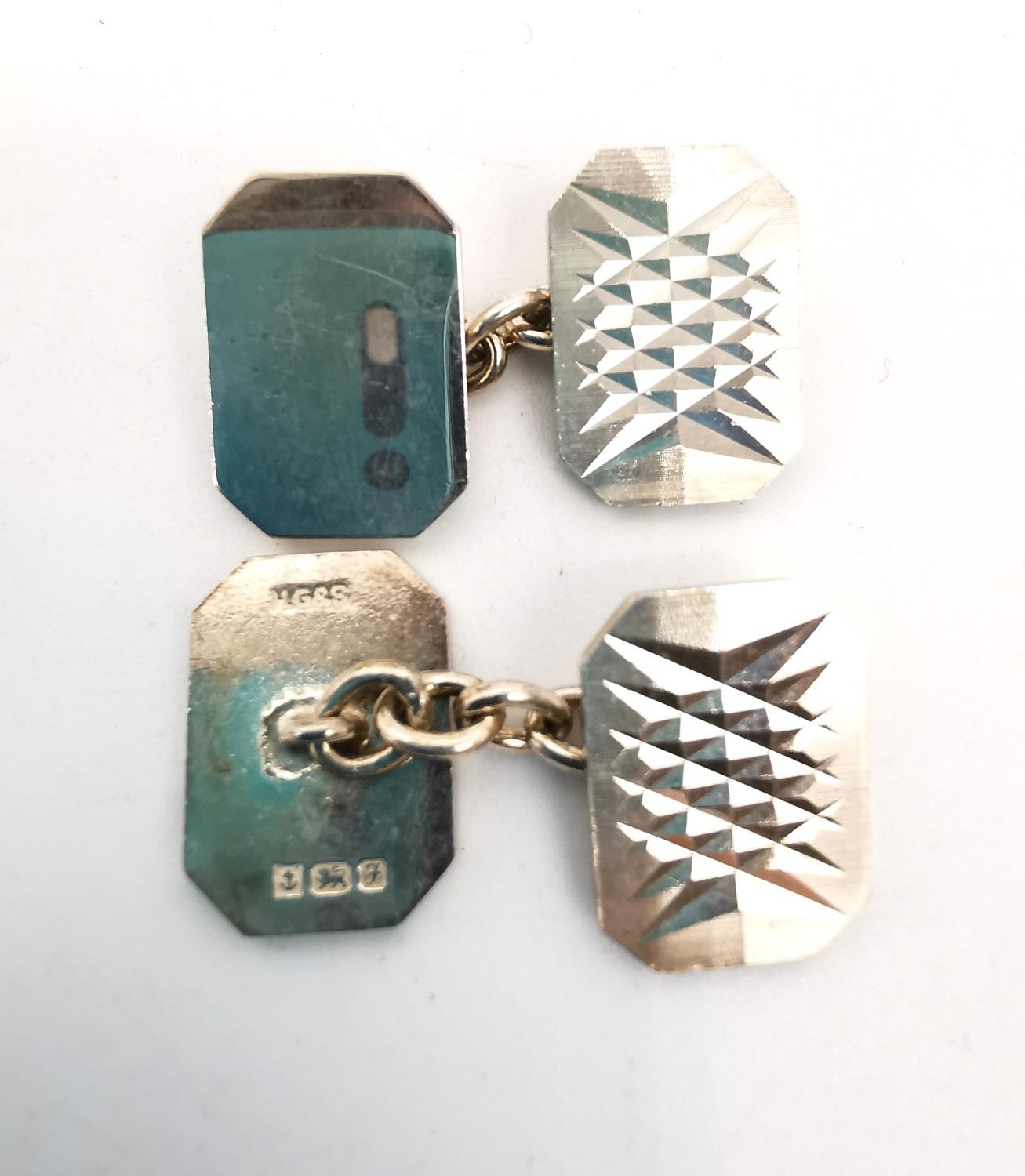 A collection of five pairs of cufflinks, one silver with a carved geometric design, a pair of silver - Image 3 of 6