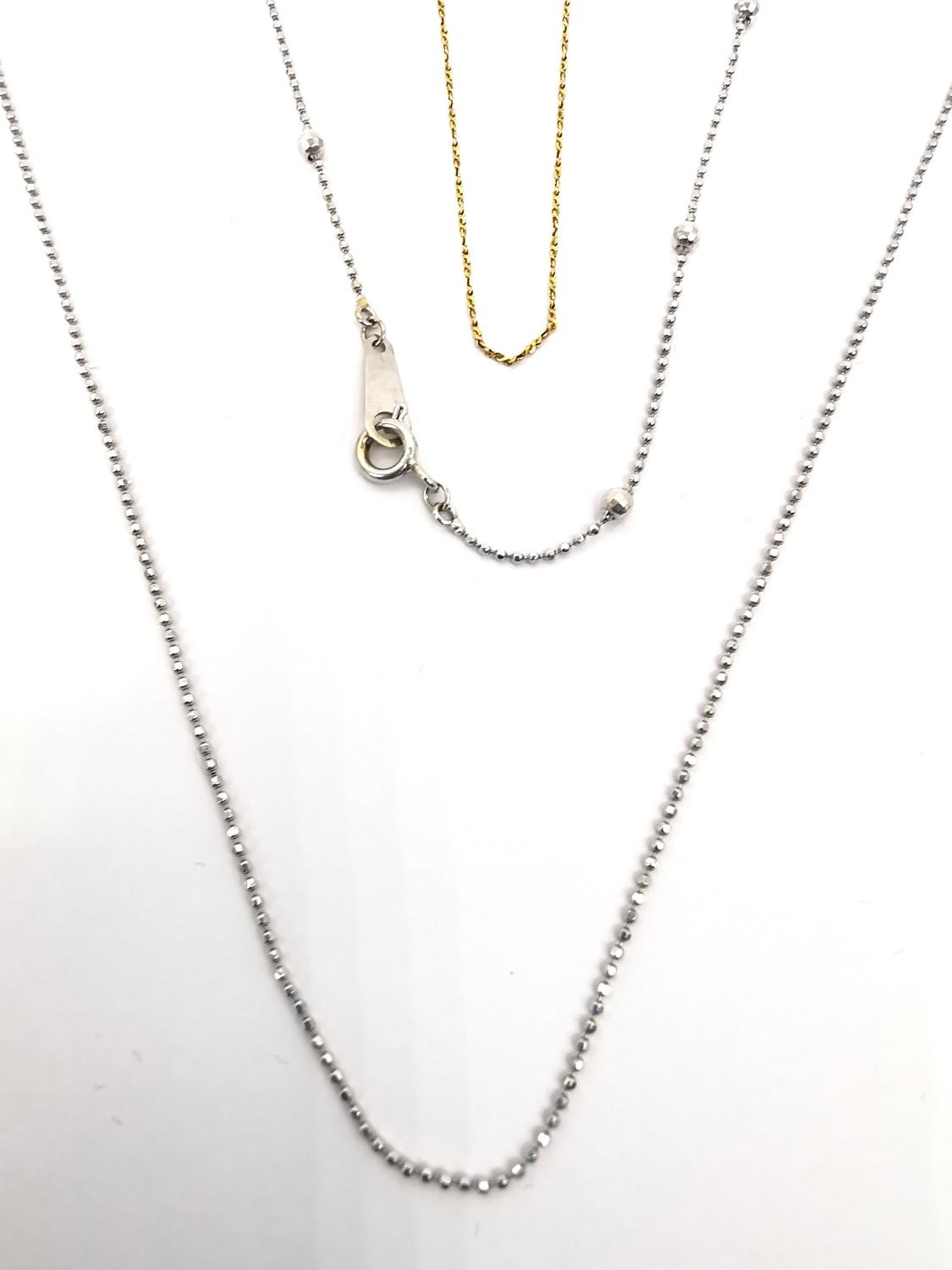 Three broken gold chain link necklaces. A 14ct white gold ball link chain. (Weight 1.50g). An 18ct - Image 2 of 5