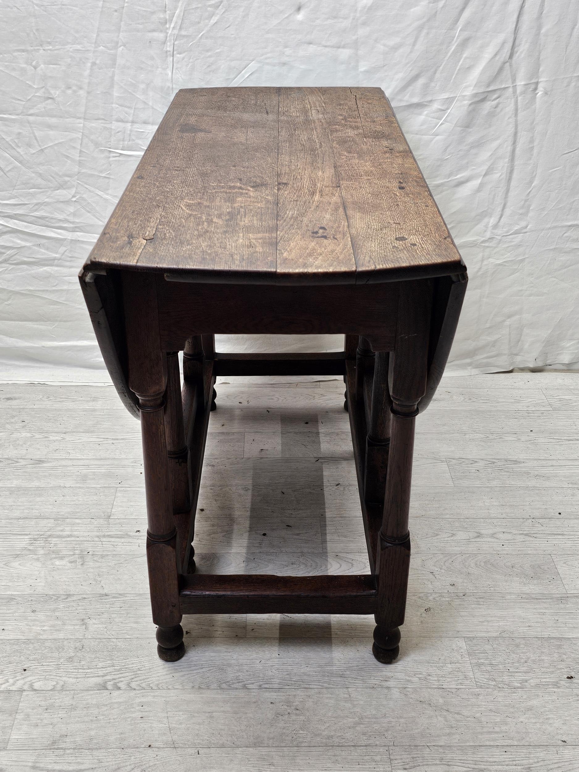 Dining table, 19th century oak with drop flap and gateleg action. H.122 D.90cm. - Image 3 of 10