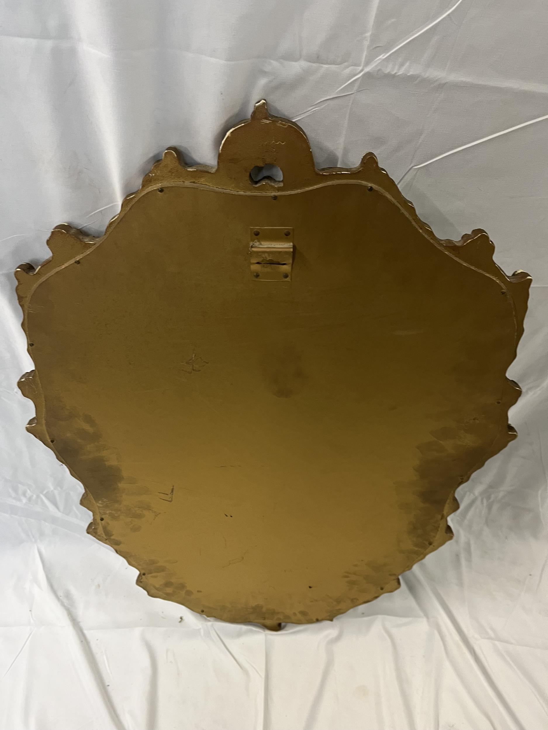 A mid century Rococo style wall mirror in gilt frame. H.81 W.59cm. - Image 5 of 5
