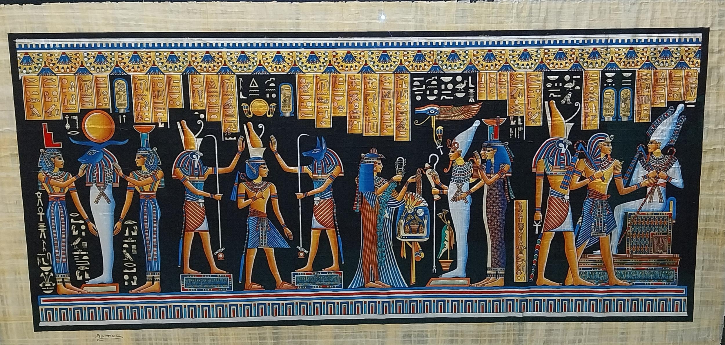 A very large Egyptian painting on papyrus, signed Jamal, framed and glazed. H.114 W.219cm. - Image 2 of 4