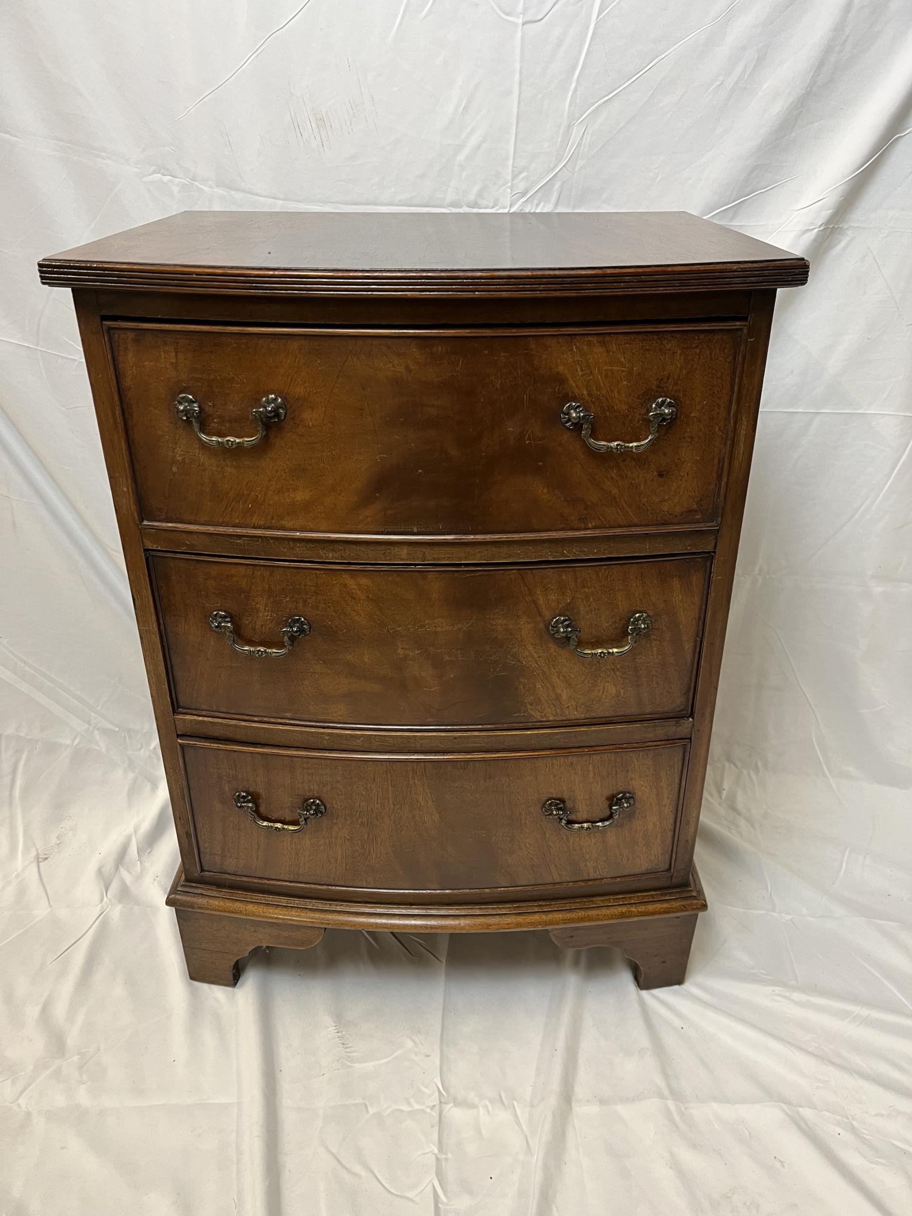 Chest, Georgian style flame mahogany bowfronted. H.72 W.54 D.43cm.