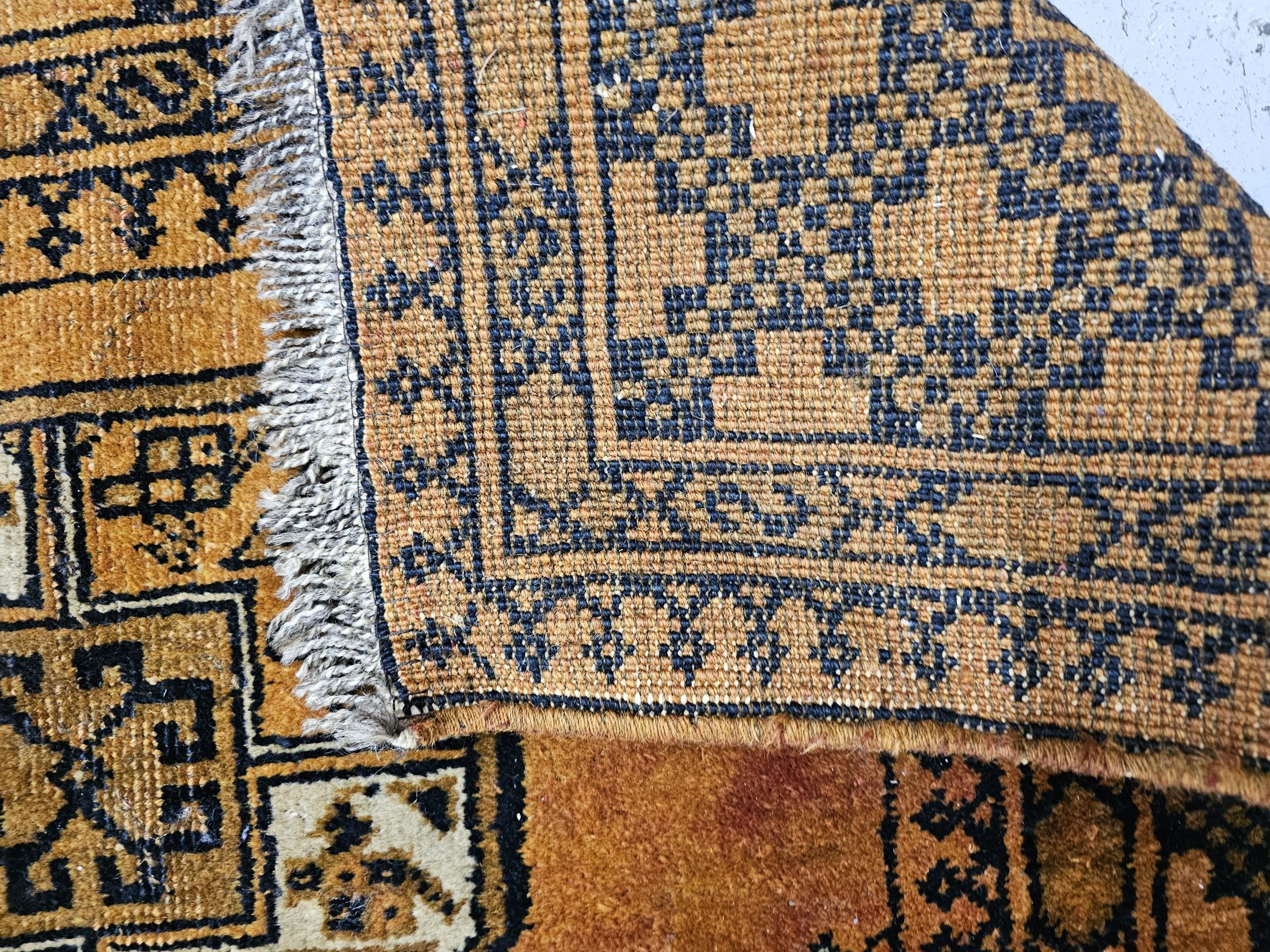 A small Afghan Bokhara rug. H.183 W.105cm. - Image 3 of 4