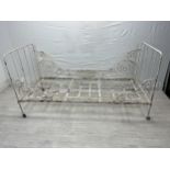 A Victorian painted metal folding single bedstead. H.96 W.184 D.79cm.