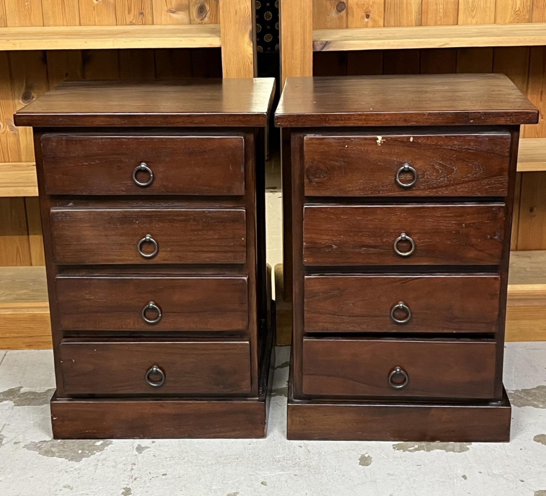 A pair of Eastern teak bedside chests by Raft furniture. H.65 W.45 D.40.cm.