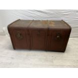 A vintage travelling trunk. H.46 W.90 D.53cm.