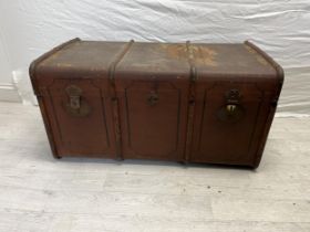 A vintage travelling trunk. H.46 W.90 D.53cm.