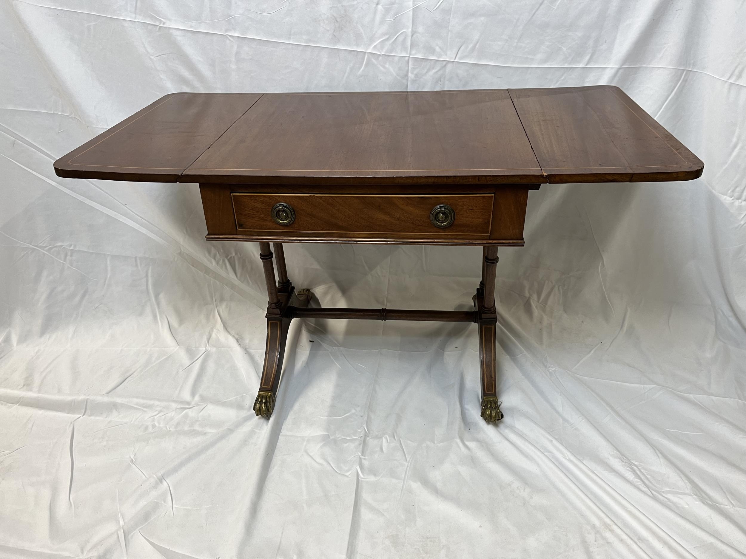 A small Regency style mahogany sofa table. H.51 W.51 D.45.5cm. Extended W.88.5cm. - Image 4 of 7