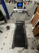 A Life Fitness folding treadmill. H.149 W.88 D.200cm. Fully working with emergency switch.