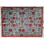 An Eastern rug with allover scrolling foliate design. H.200 W.156cm.