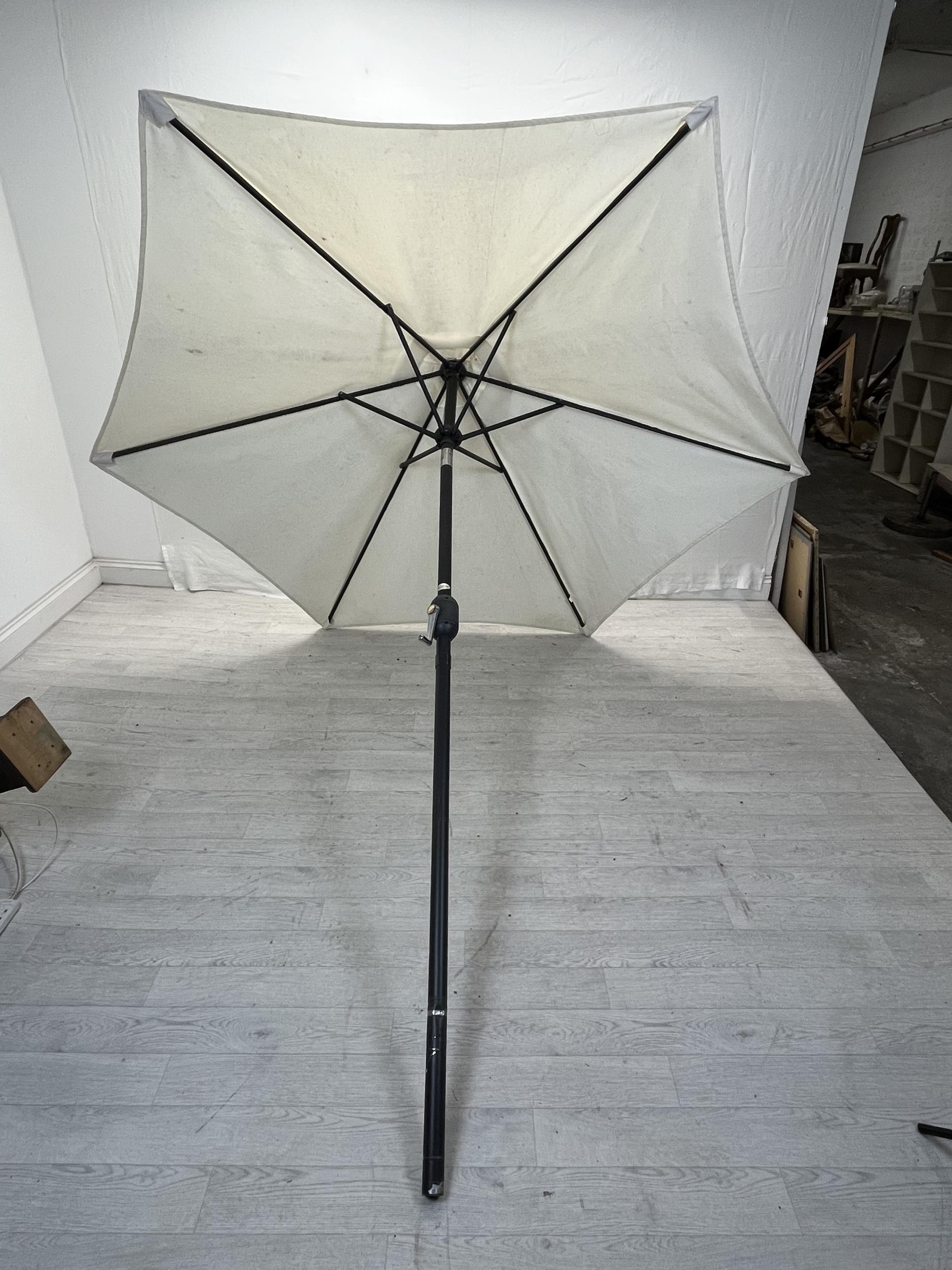 An adjustable wind up parasol, Dia.228cm H.230cm. with concrete base along with another slightly - Image 2 of 7
