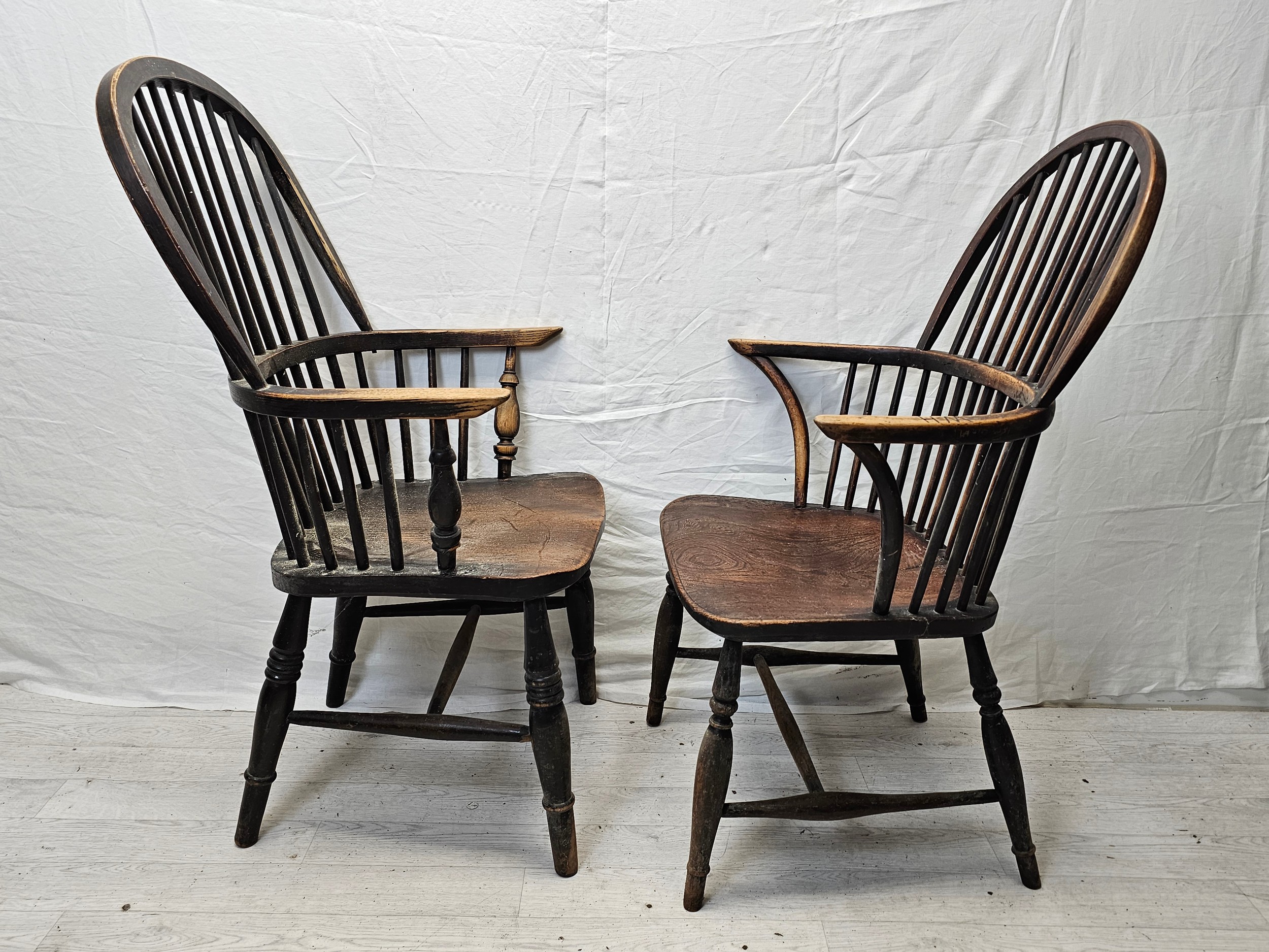 Two 19th century elm seated hoop back Windsor armchairs on turned and stretchered supports. - Image 2 of 6