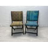 A pair of contemporary folding upholstered chairs. H.82cm.