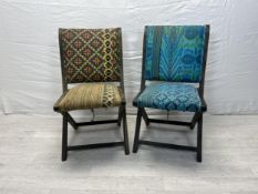 A pair of contemporary folding upholstered chairs. H.82cm.