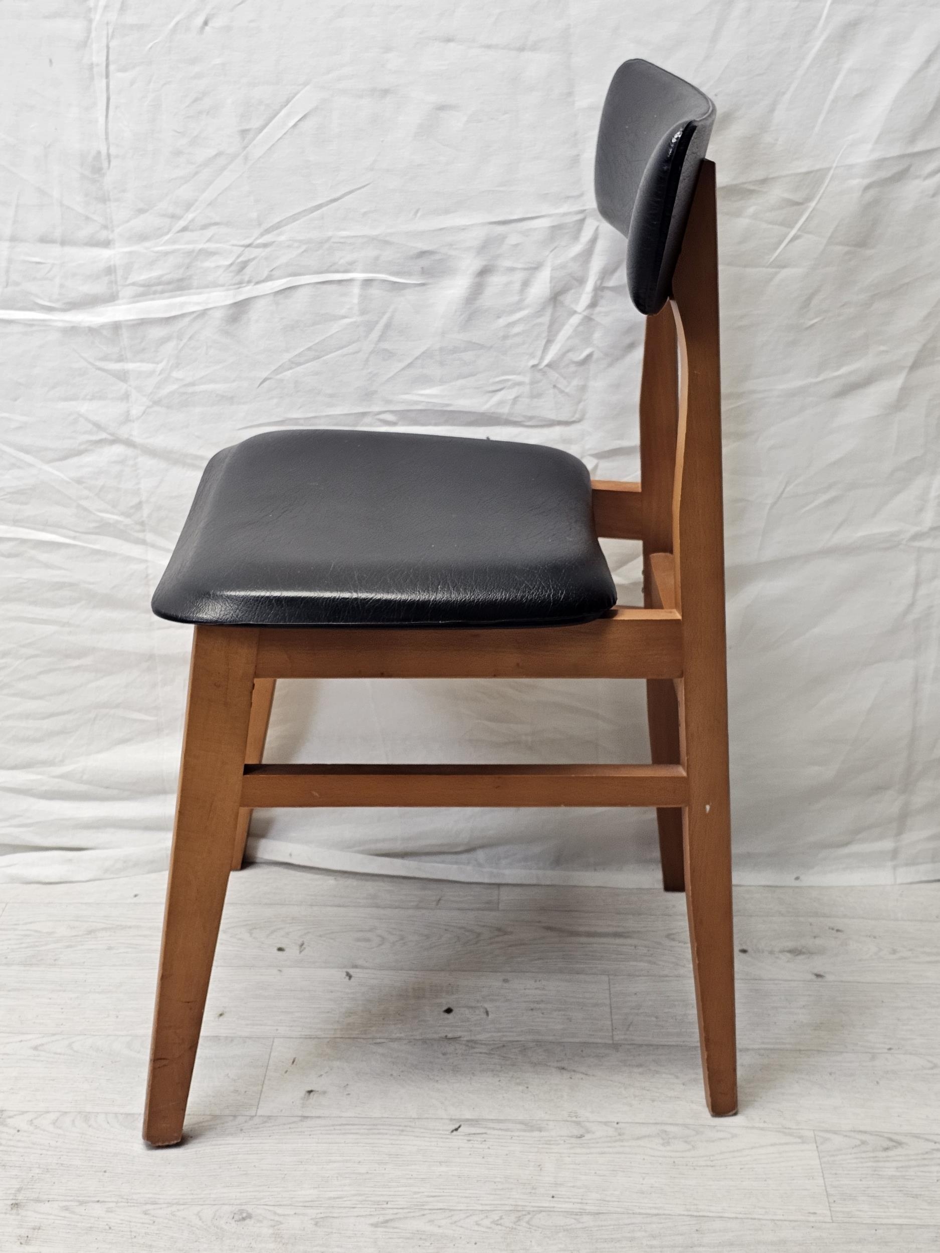 A set of four 1970's vintage teak and vinyl dining chairs by Schreiber along with a pair of similar. - Image 8 of 8