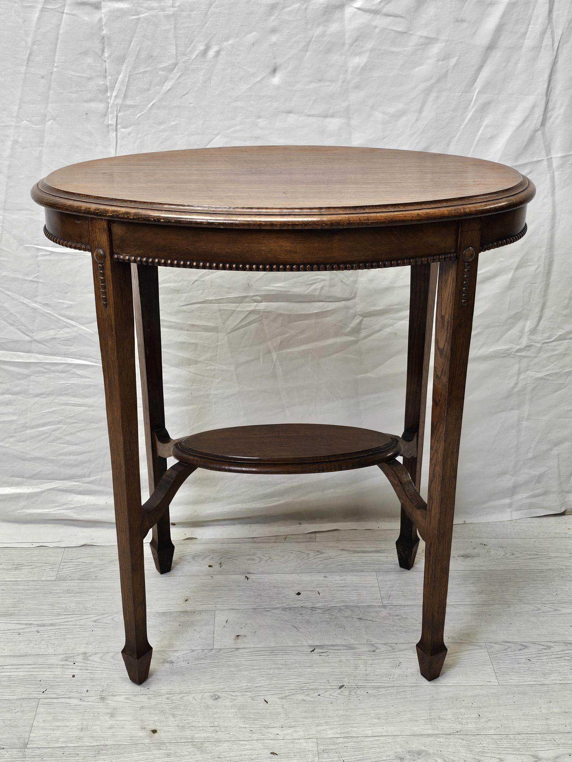Occasional or lamp table, C.1900 oak. H.75 W.68 D.46cm.