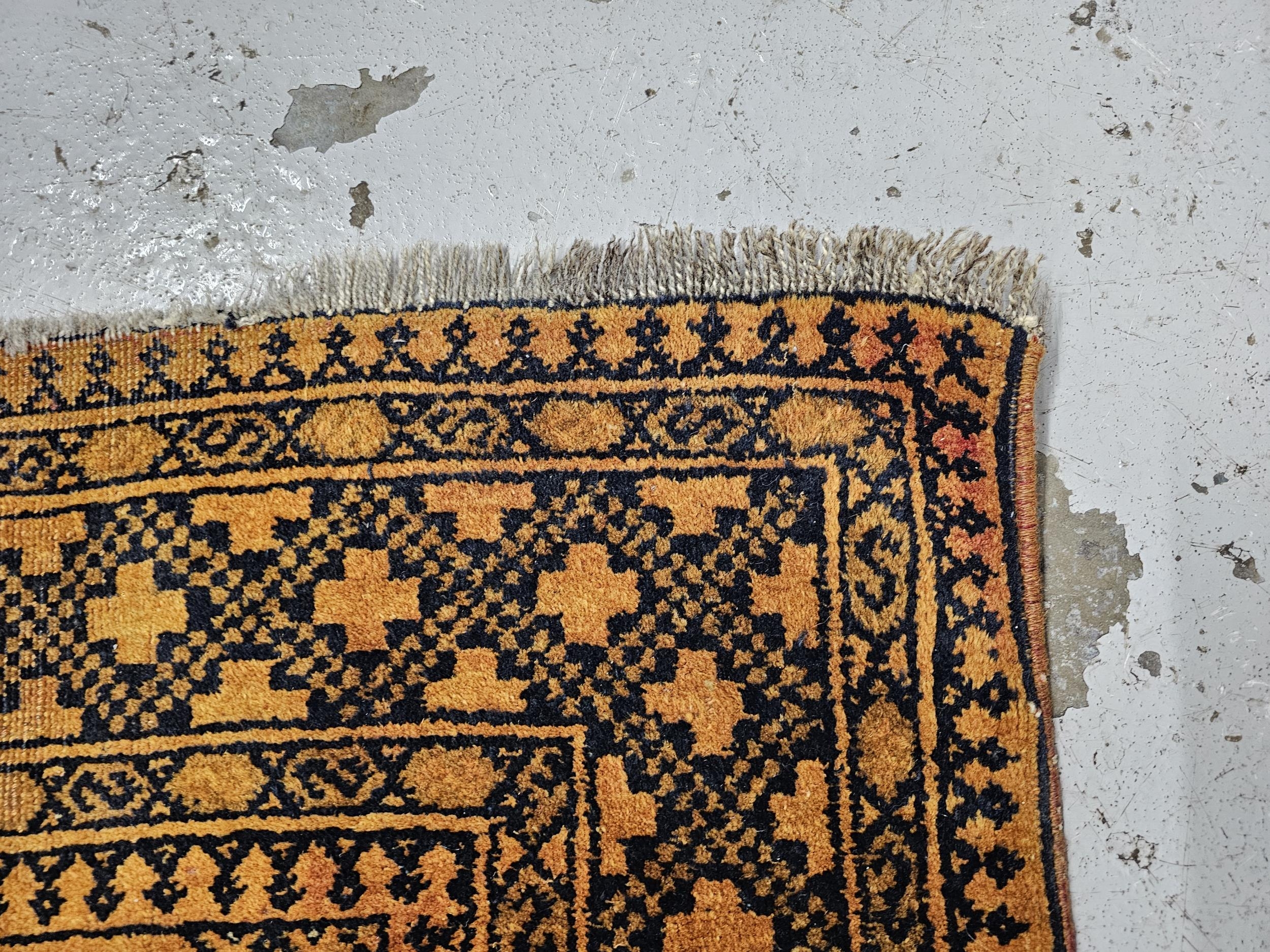 A small Afghan Bokhara rug. H.183 W.105cm. - Image 2 of 4