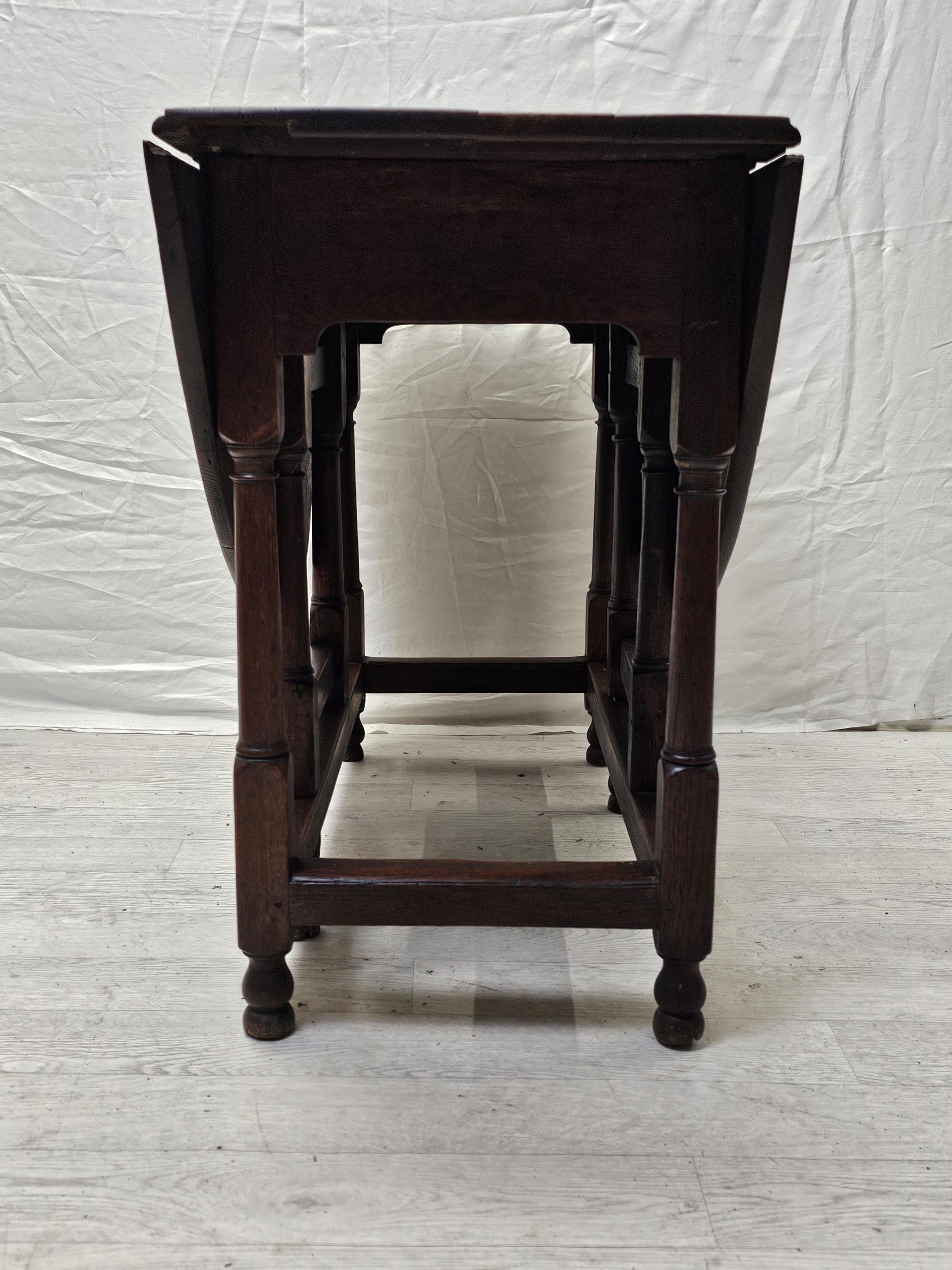 Dining table, 19th century oak with drop flap and gateleg action. H.122 D.90cm. - Image 4 of 10
