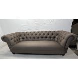 Chesterfield sofa, contemporary on turned supports. (Some stains and burn marks) H.70 W.215 D.90cm.