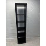 A contemporary full height narrow open bookcase. H.184.5 W.44 D.39cm.