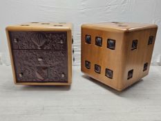 A pair of hardwood bedside cabinets, carved and inset and in the form of a pair of dice. H.70 W.67