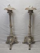 A pair of distressed painted 19th century style metal pricket candlestands. H.123cm.