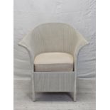 A vintage Lloyd Loom tub armchair.