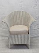 A vintage Lloyd Loom tub armchair.