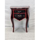 A small contemporary lacquered and painted Continental style commode chest. H.71 W.57 D.49