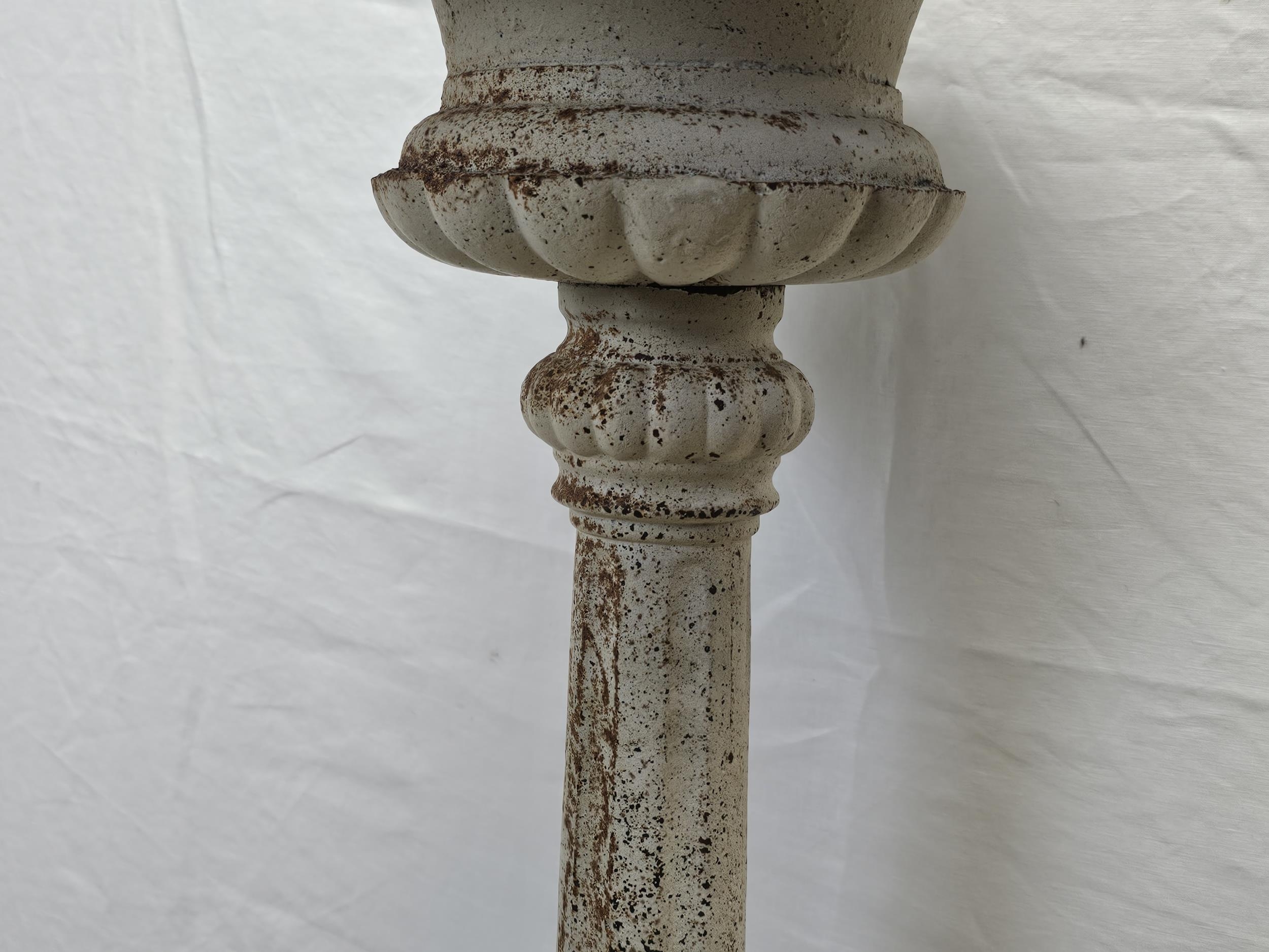 A pair of distressed painted 19th century style metal pricket candlestands. H.123cm. - Image 3 of 5