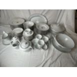 An extensive Limoges dinner service for twelve, a total of 84 pieces in new or nearly new condition,