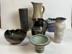 A miscellaneous collection of studio pottery, jugs, vases and bowls, seven pieces. Tallest is H.