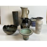 A miscellaneous collection of studio pottery, jugs, vases and bowls, seven pieces. Tallest is H.