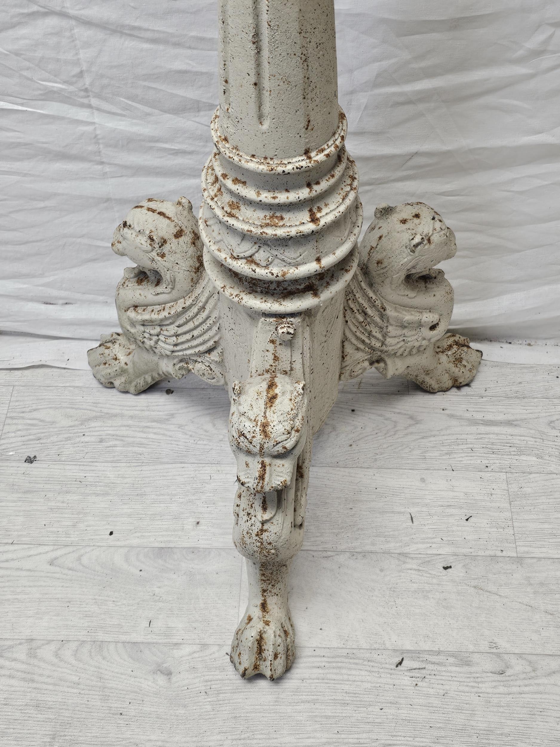 A pair of distressed painted 19th century style metal pricket candlestands. H.123cm. - Image 4 of 5