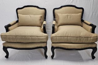 A pair of contemporary (as new) Louis XV style ebonised armchairs.