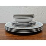 A Wedgwood "Florentine Turquoise" part dinner service for four people. Large plates are W.27cm. (Qty